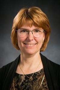 Dr. Christine Benson